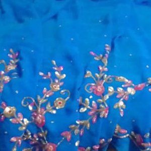 Beautiful Blue Saree with Floral Work and short sleeve Back Knot blouse